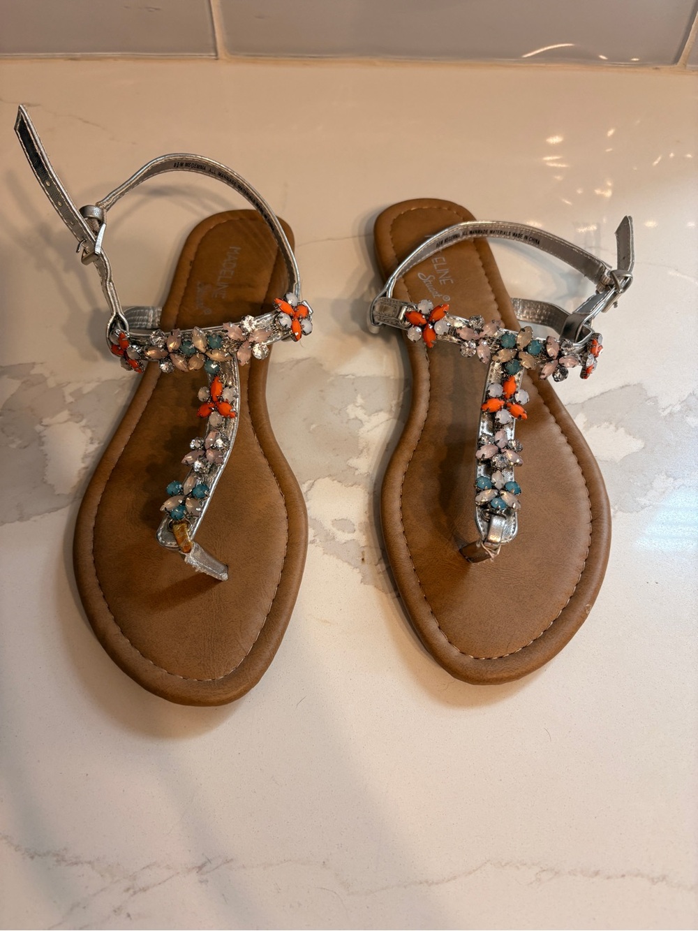 Madeline Stuart Silver T-Strap Jeweled Women’s Sandals